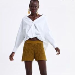 Crochet knit Bermuda shorts.